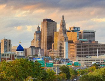 Sunset skyline with blue-domed church